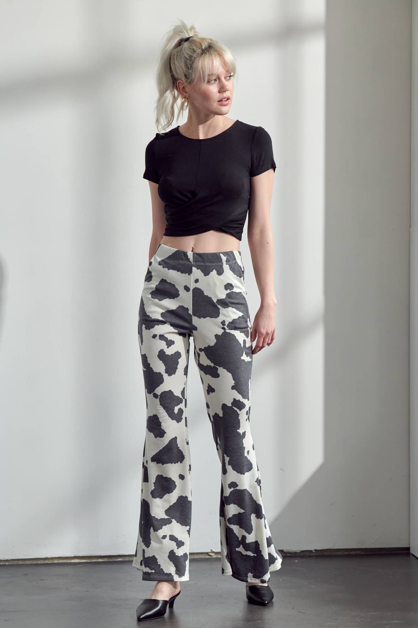 COW PRINT FLARED PANTS
