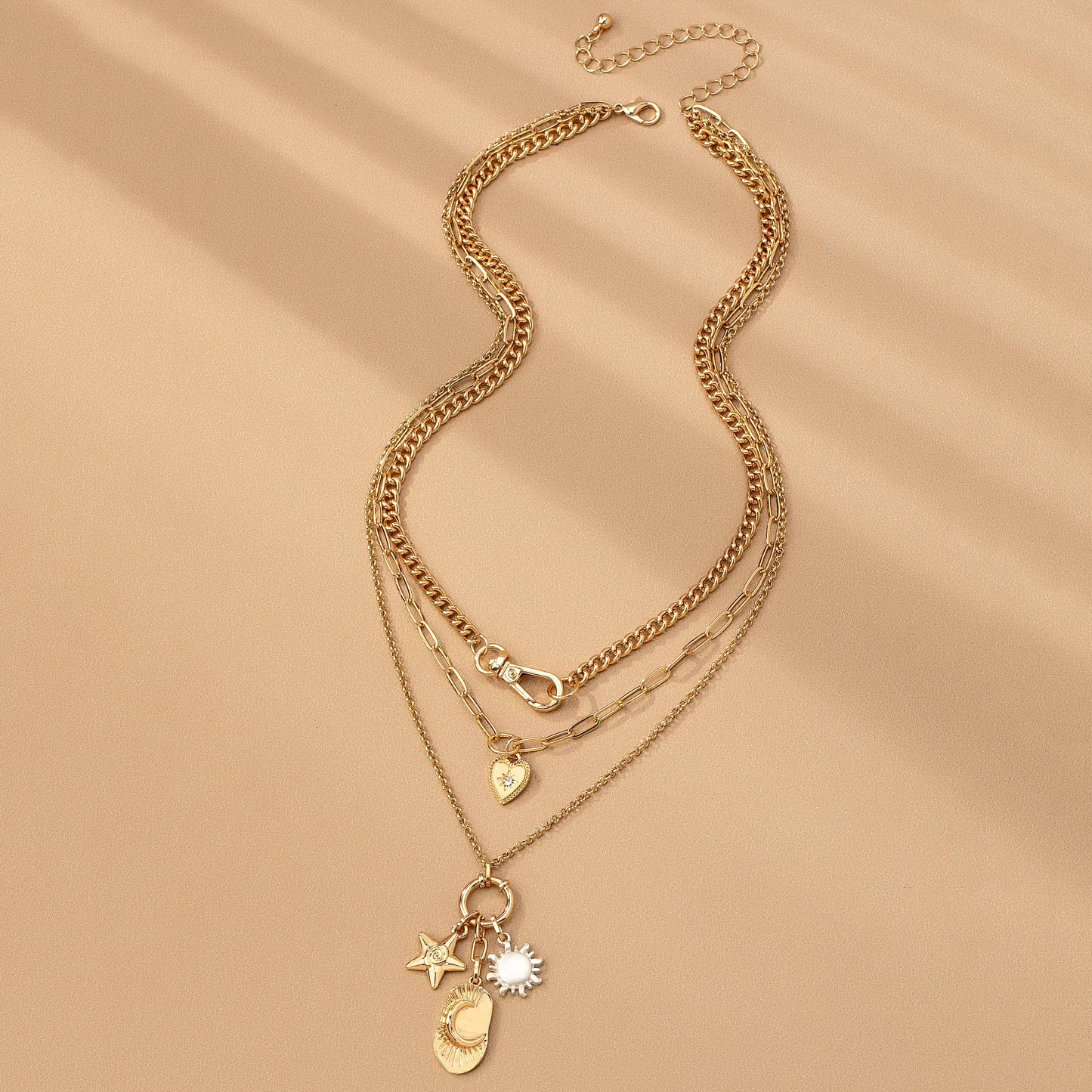 J26. MULTI LAYER CELESTIAL STAR MOON CHARM NECKLACE