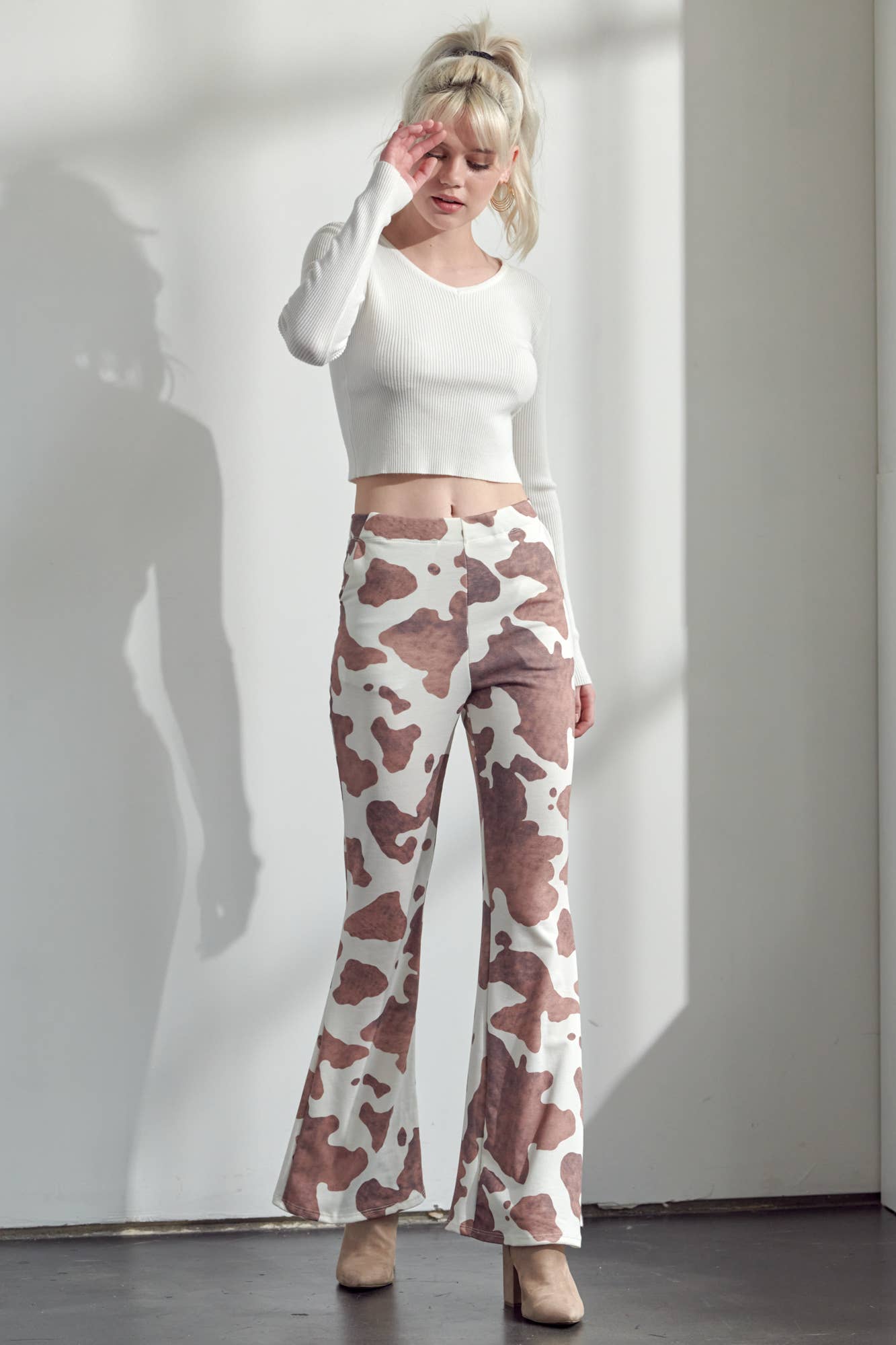 COW PRINT FLARED PANTS