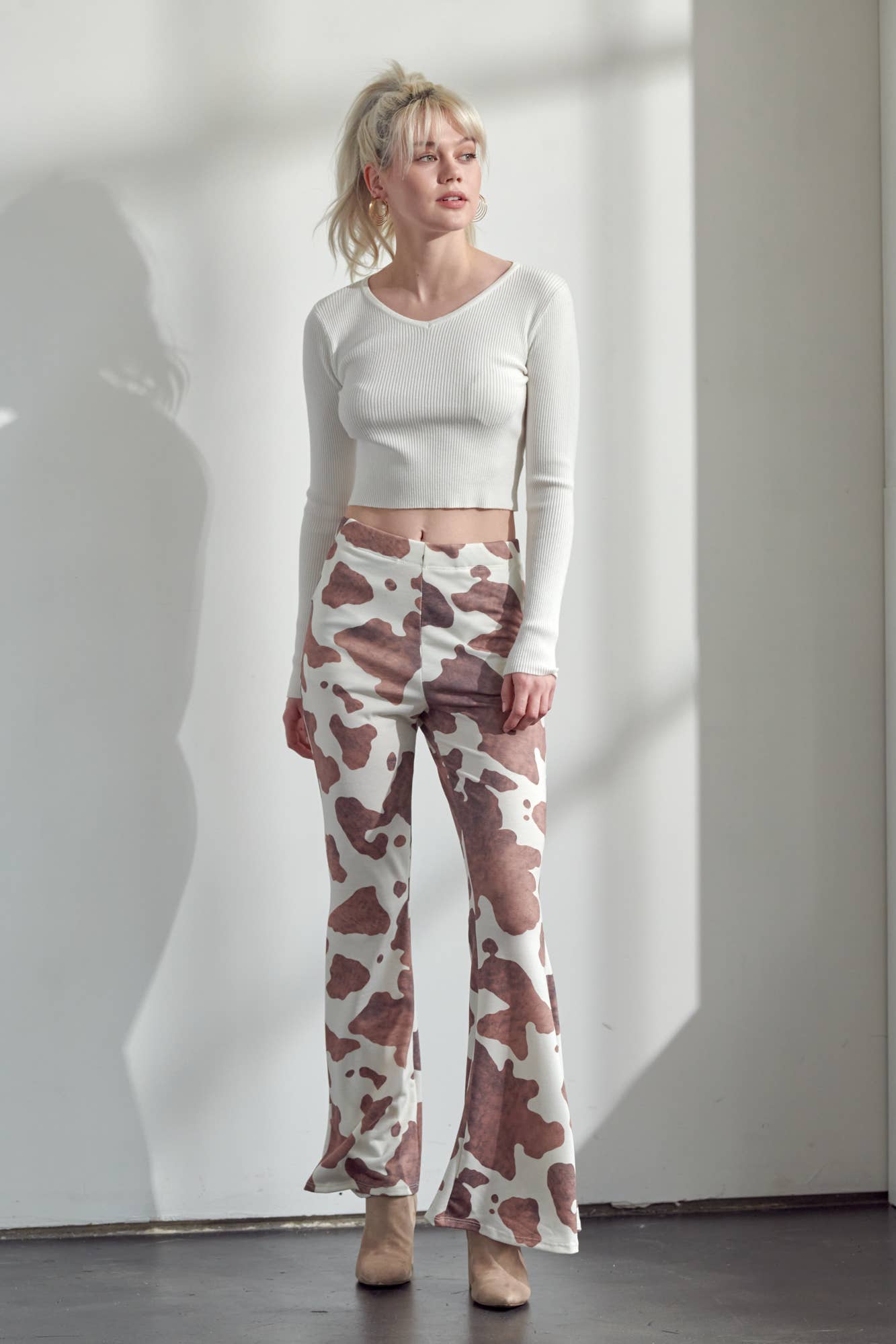 COW PRINT FLARED PANTS