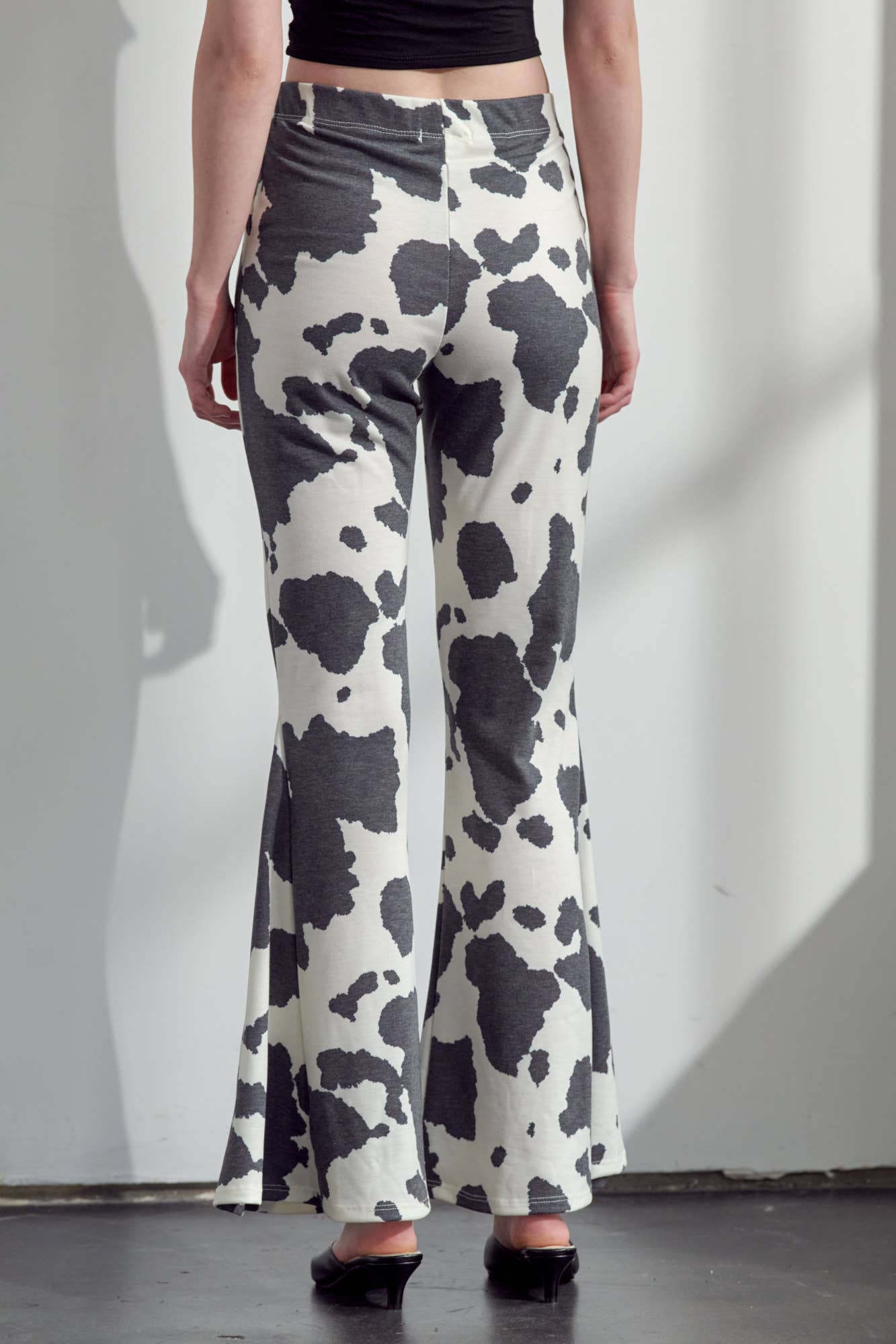 COW PRINT FLARED PANTS