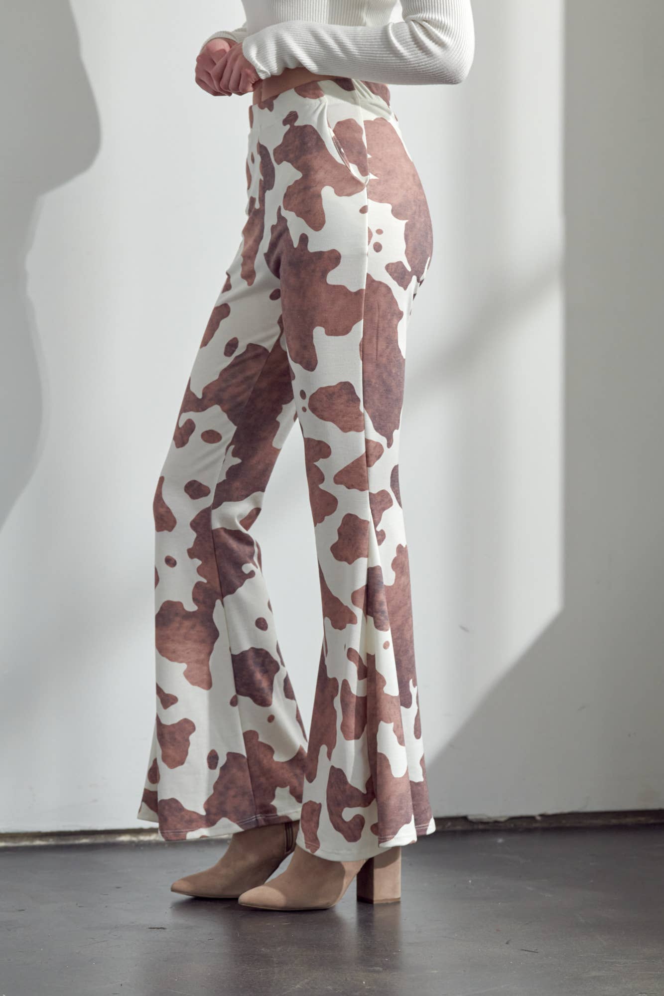 COW PRINT FLARED PANTS