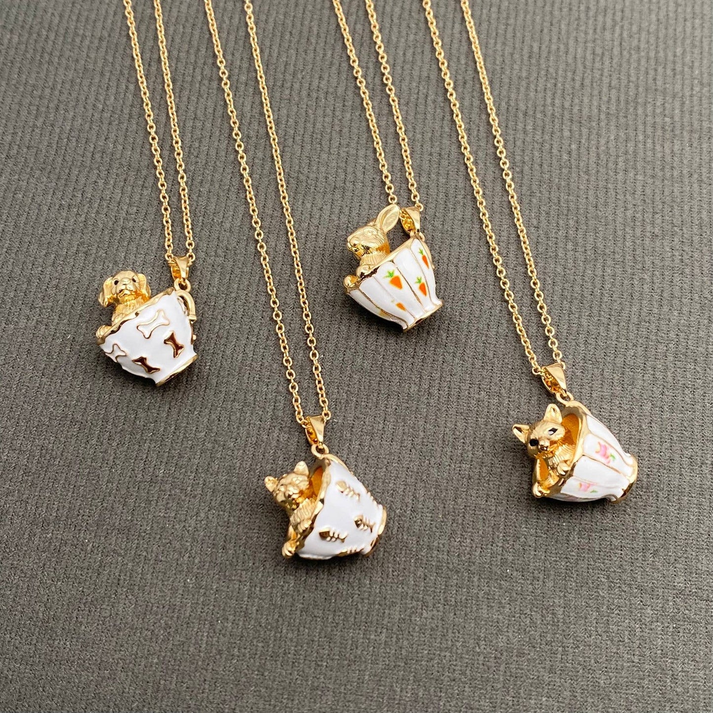 M34. Small Animals In A Teacup Charm Necklace