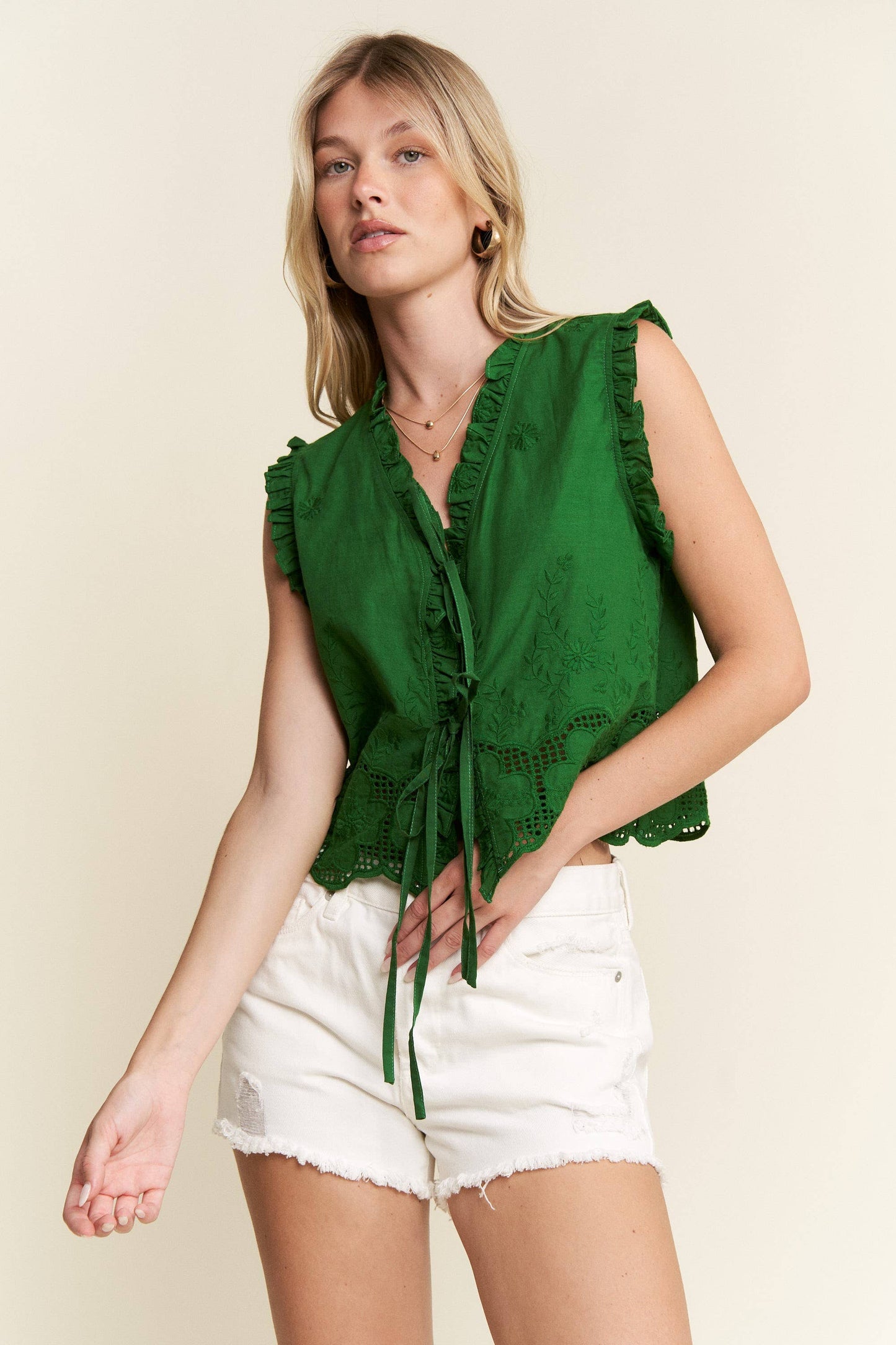 SLEEVELESS RUFFLE FRONT TIE TOP