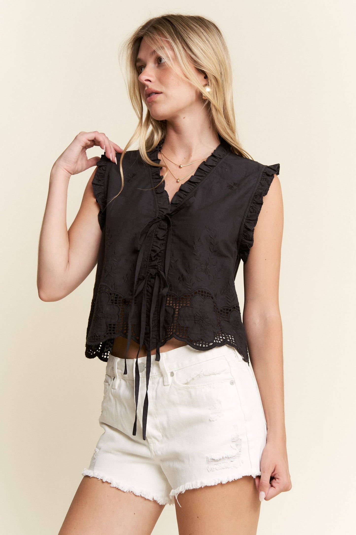 SLEEVELESS RUFFLE FRONT TIE TOP