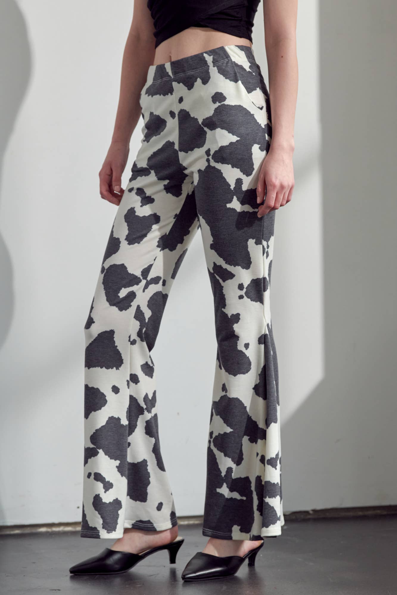 COW PRINT FLARED PANTS