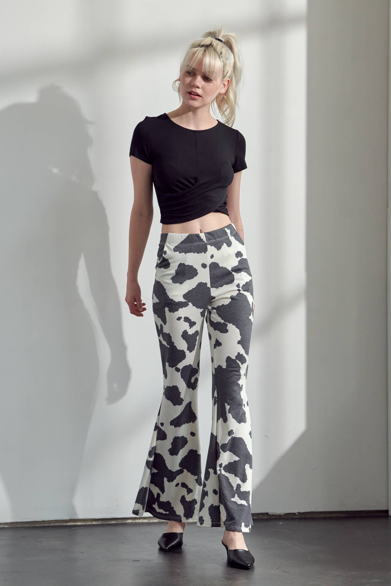 COW PRINT FLARED PANTS