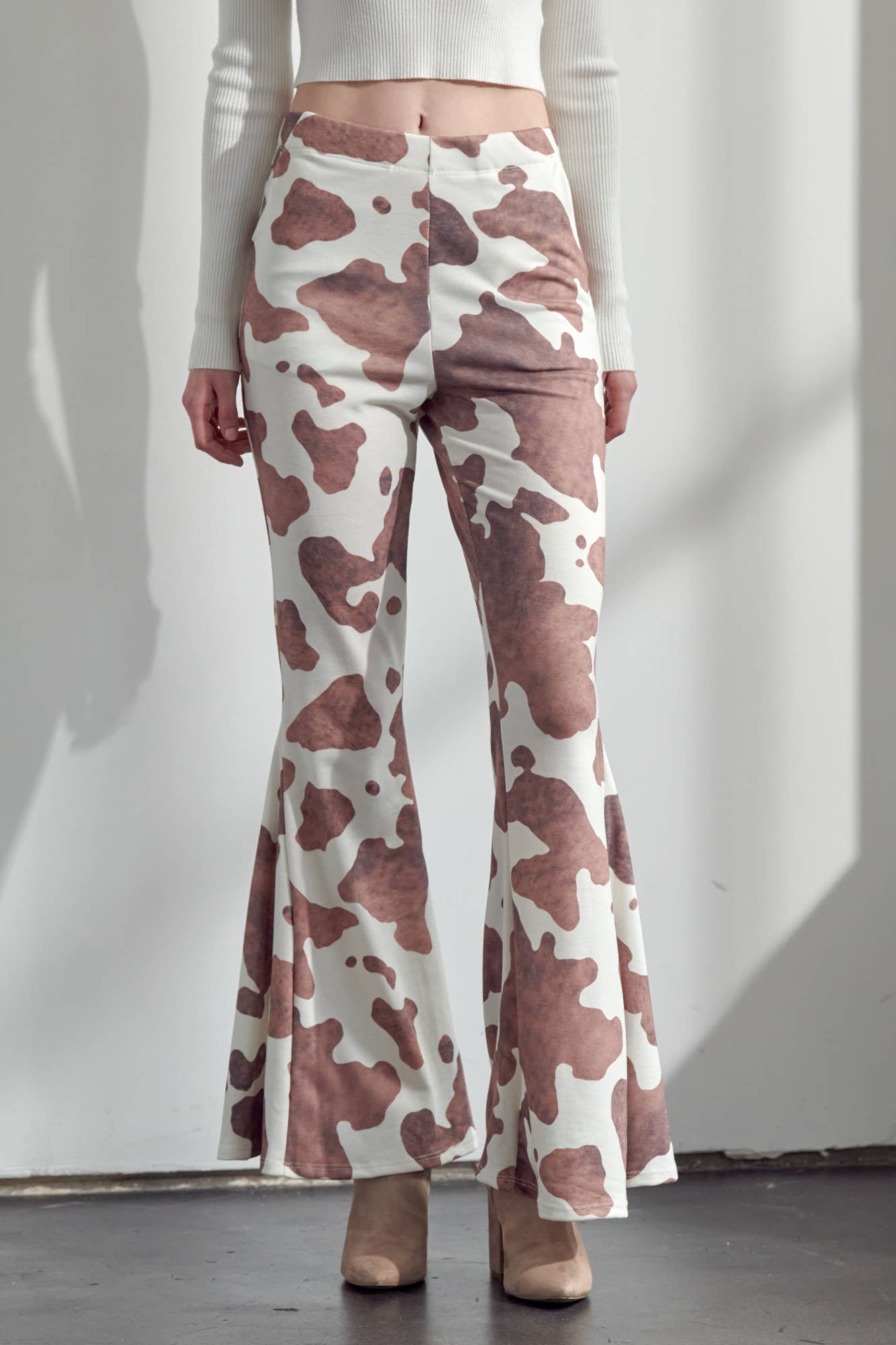 COW PRINT FLARED PANTS