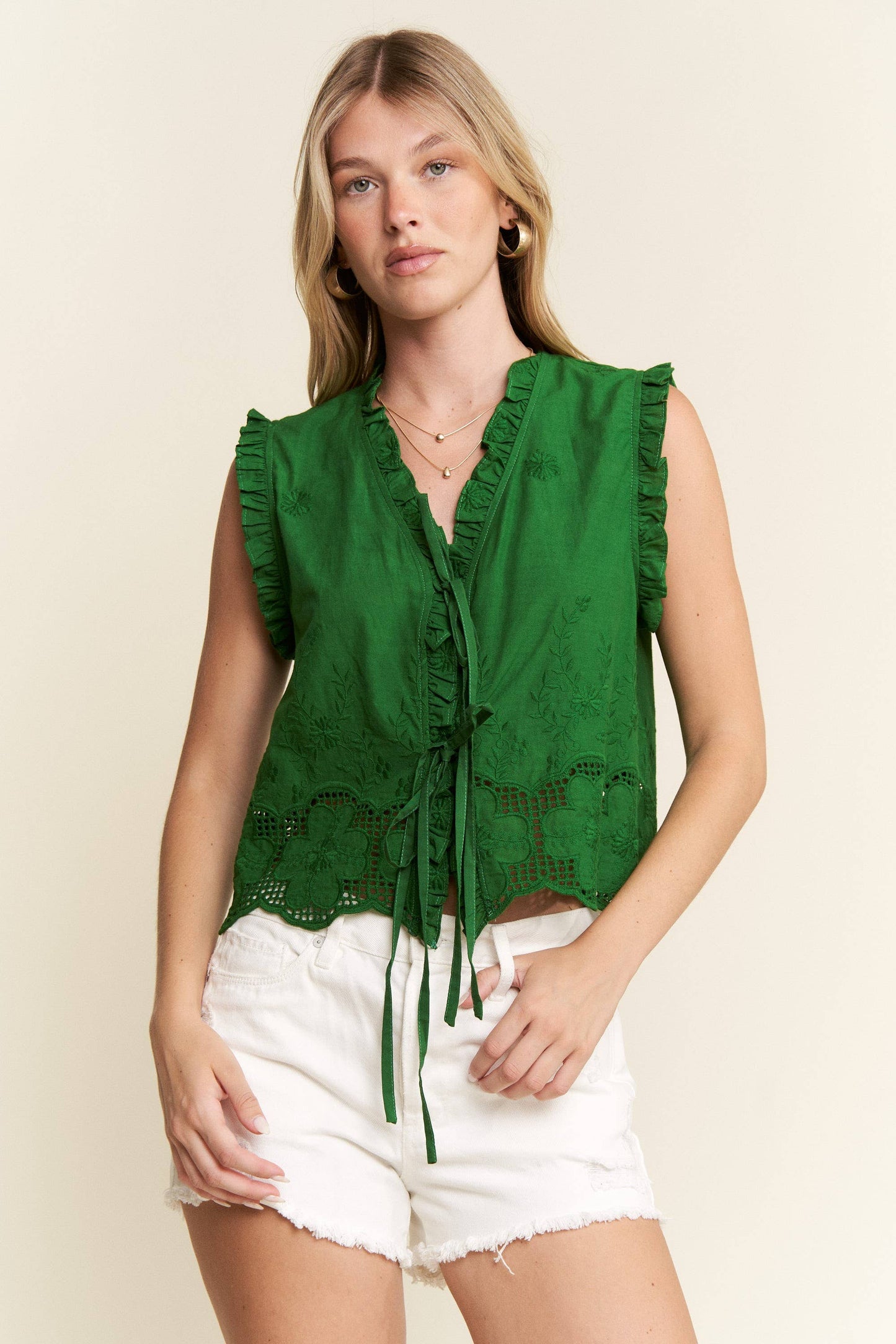 SLEEVELESS RUFFLE FRONT TIE TOP