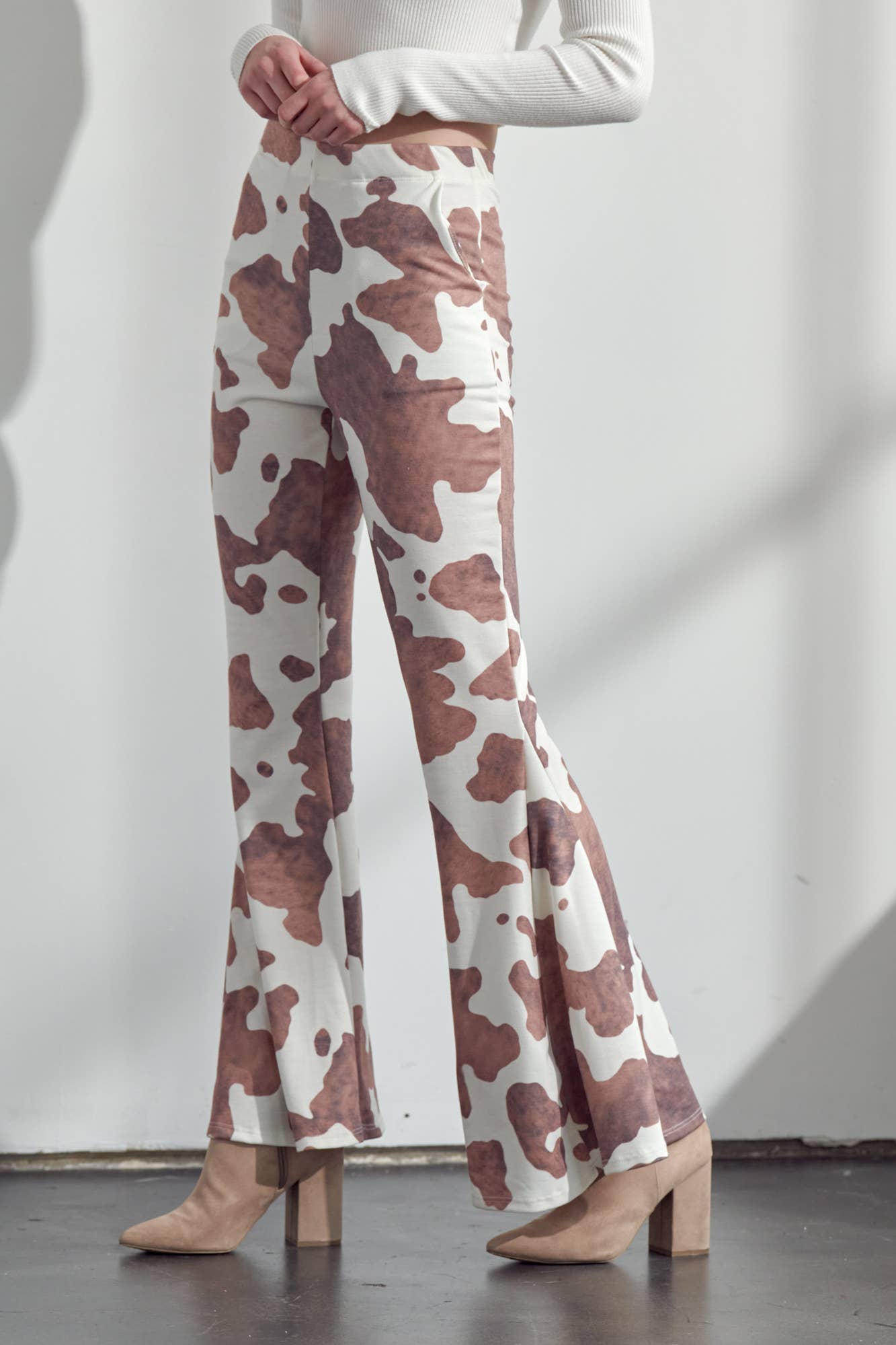 COW PRINT FLARED PANTS