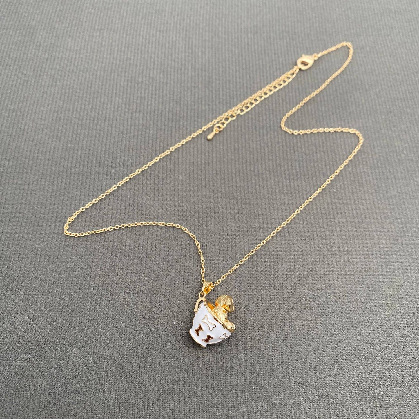 M34. Small Animals In A Teacup Charm Necklace