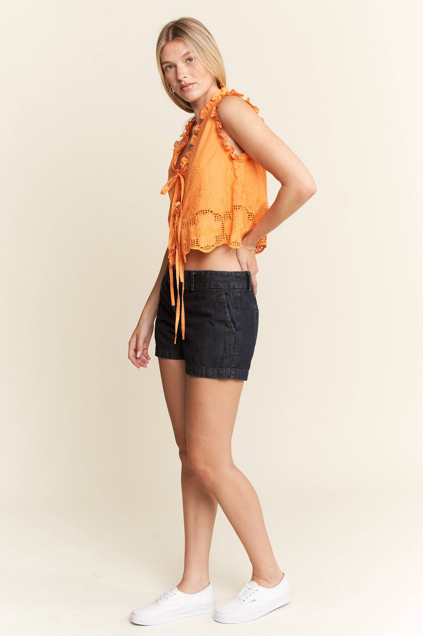 SLEEVELESS RUFFLE FRONT TIE TOP