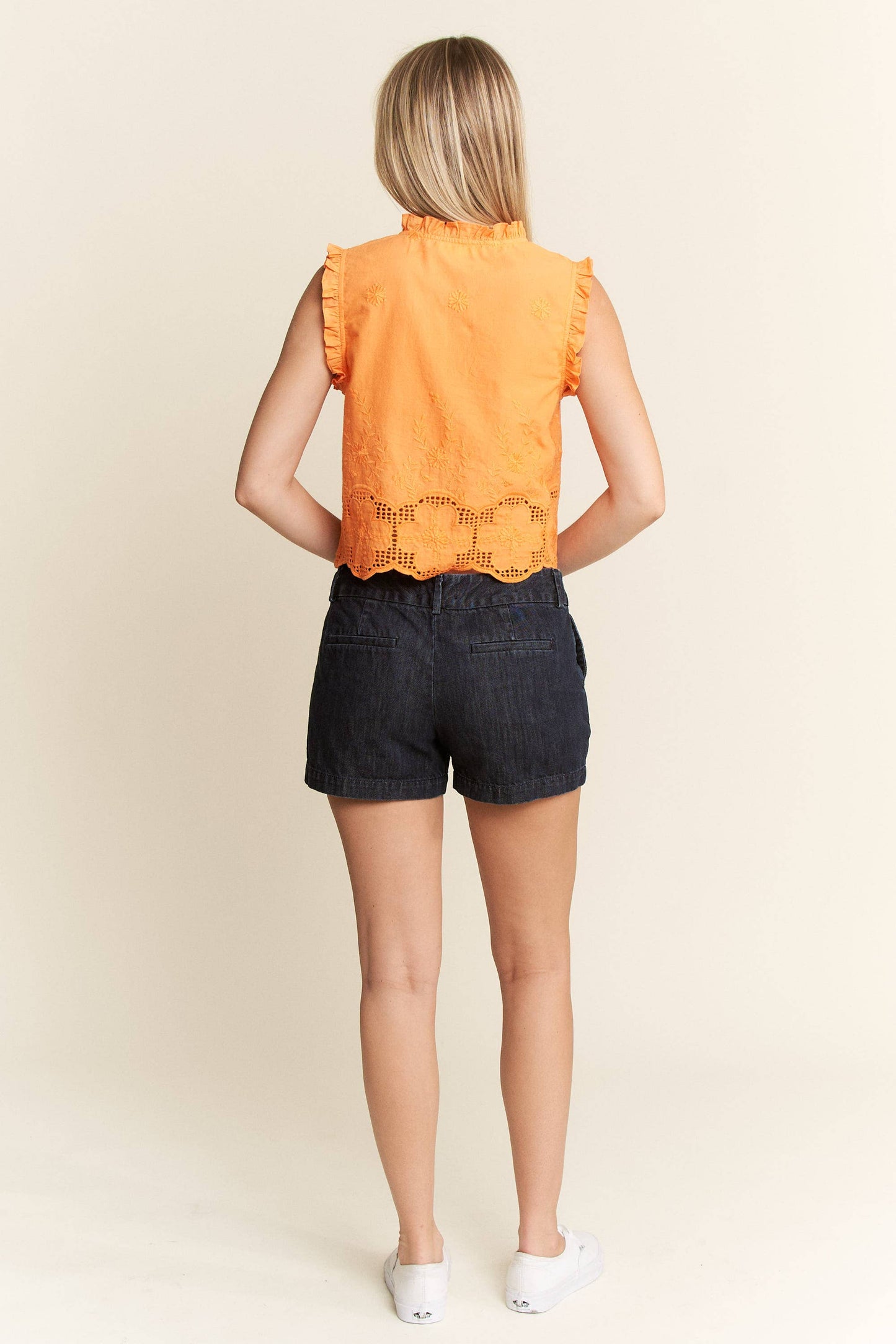 SLEEVELESS RUFFLE FRONT TIE TOP