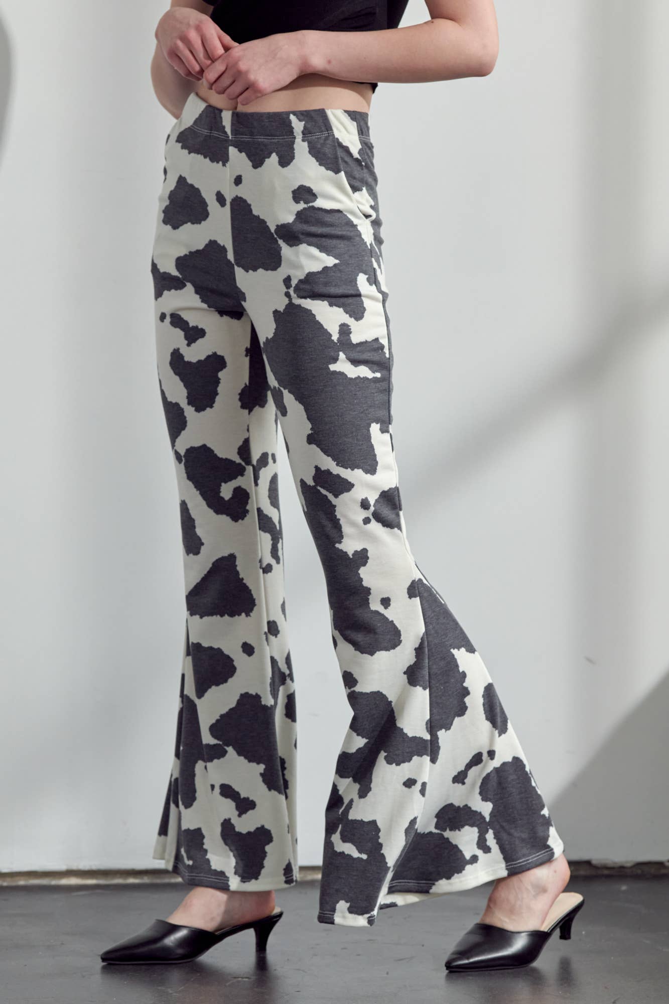 COW PRINT FLARED PANTS