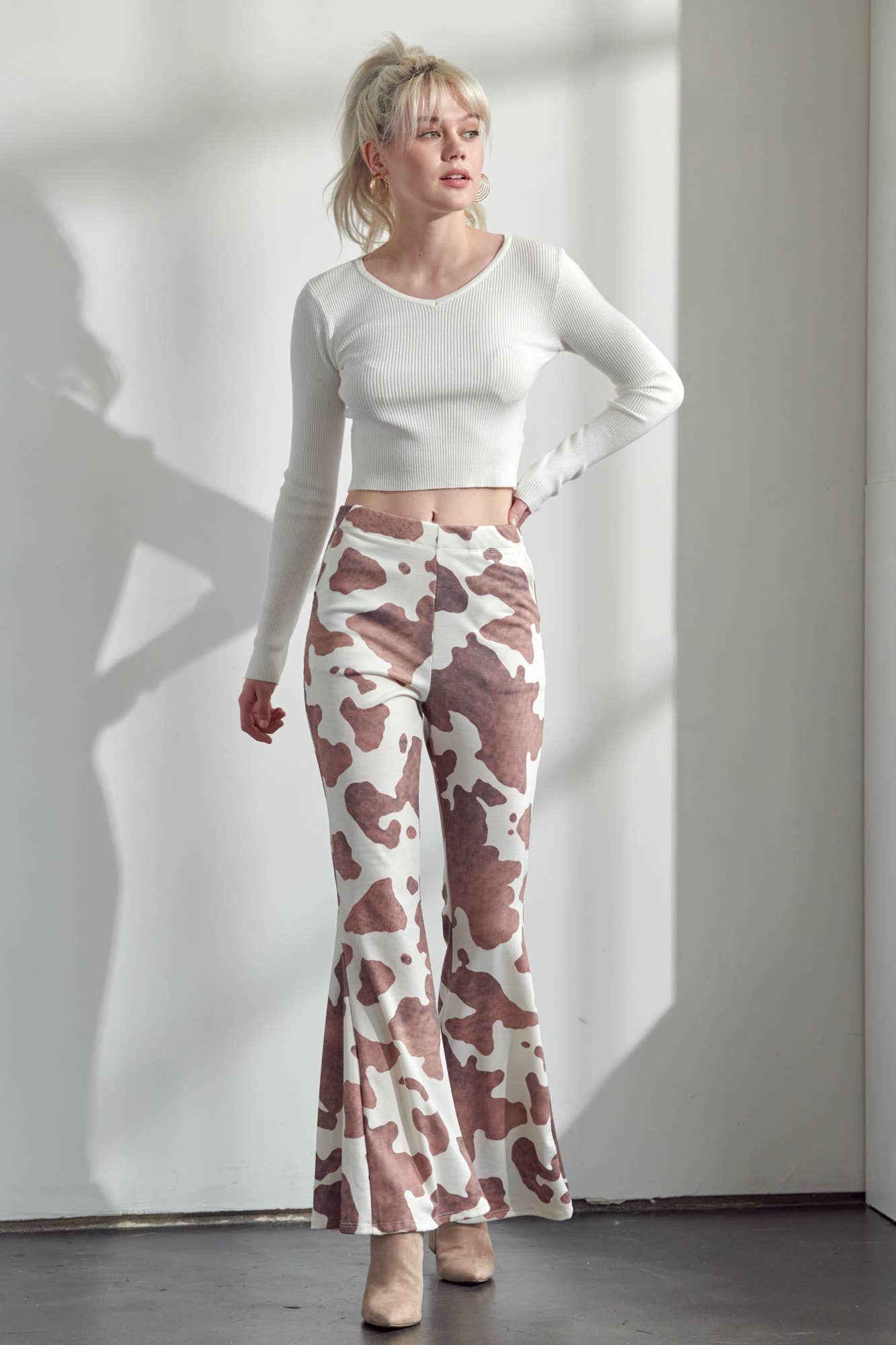 COW PRINT FLARED PANTS