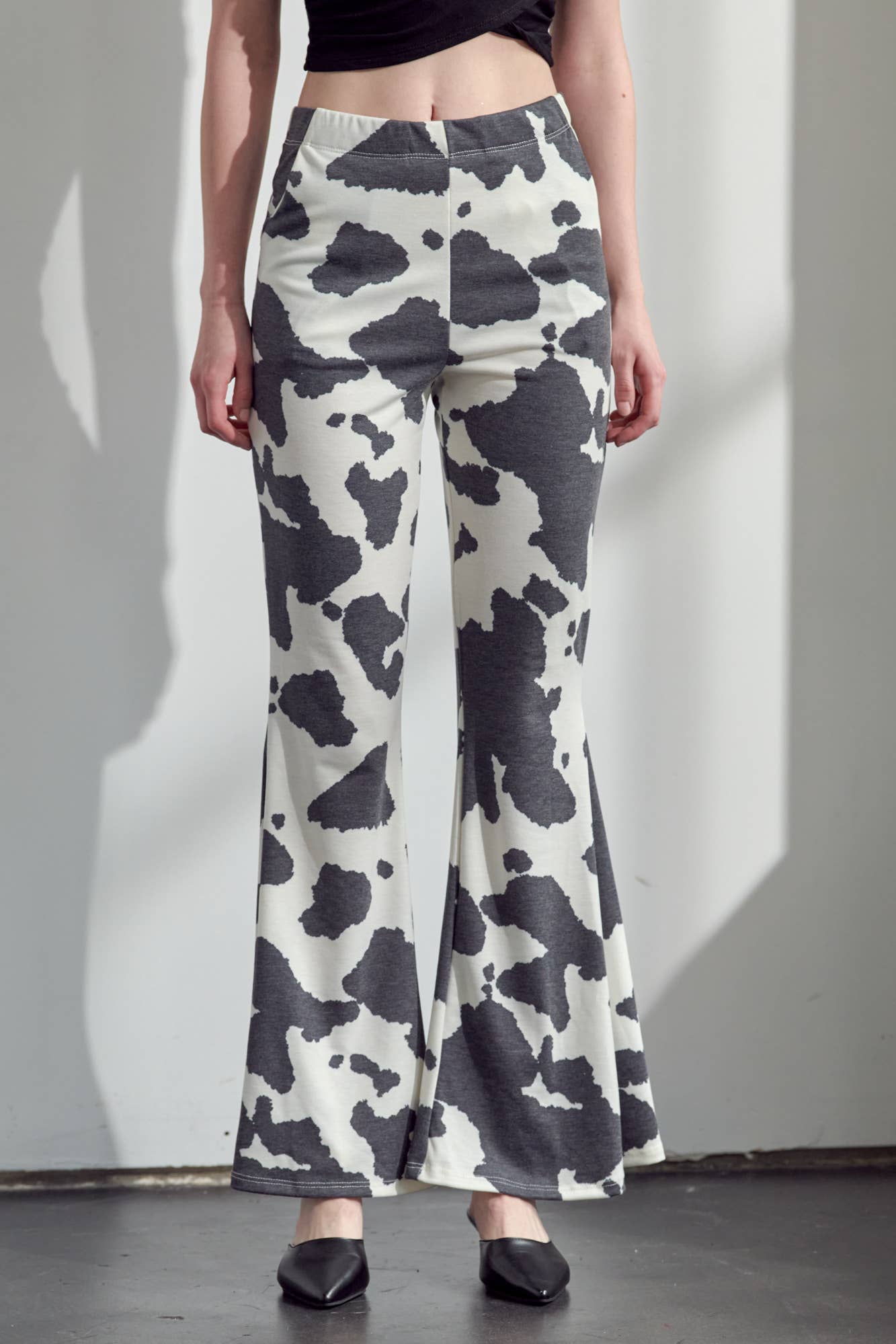 COW PRINT FLARED PANTS