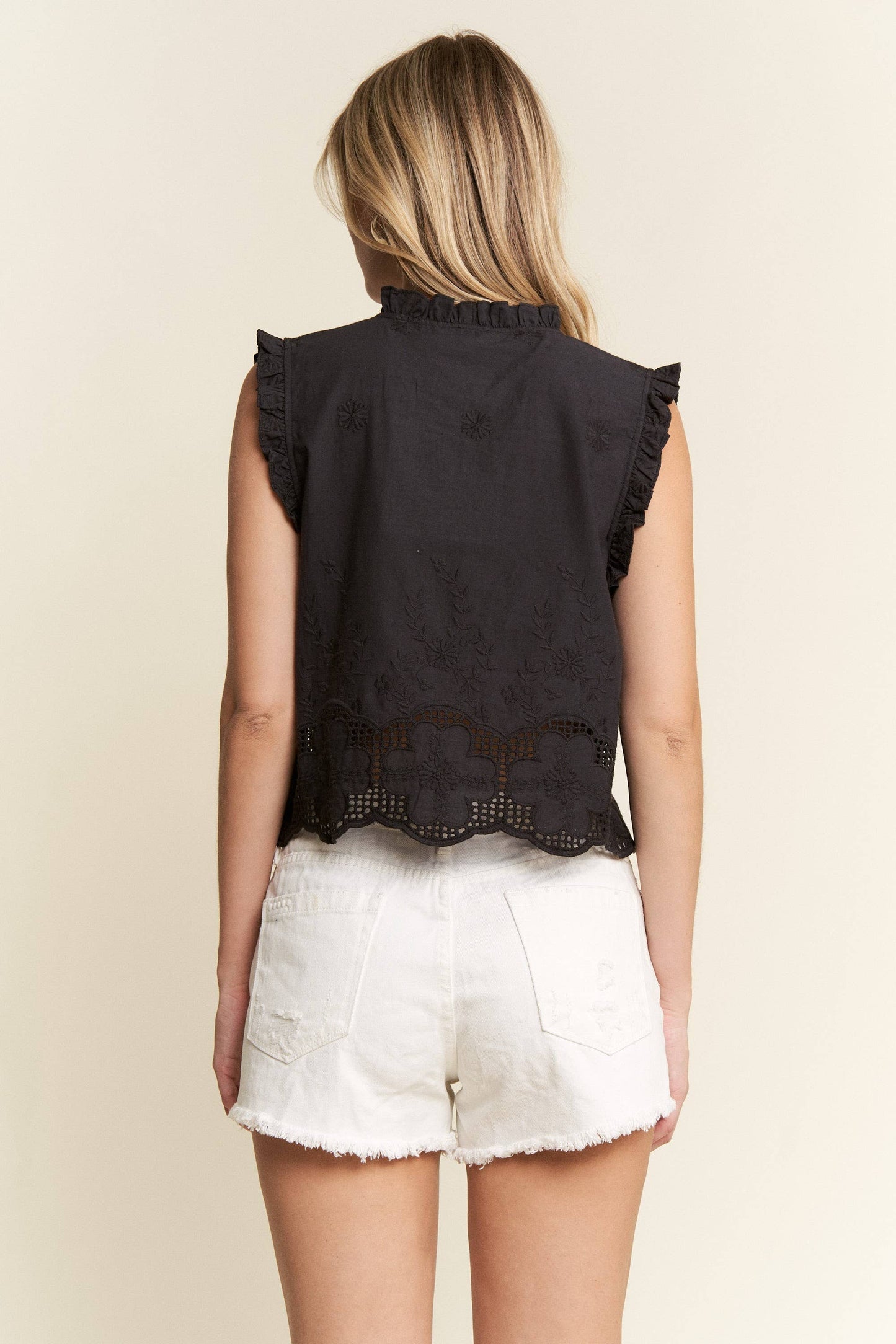 SLEEVELESS RUFFLE FRONT TIE TOP