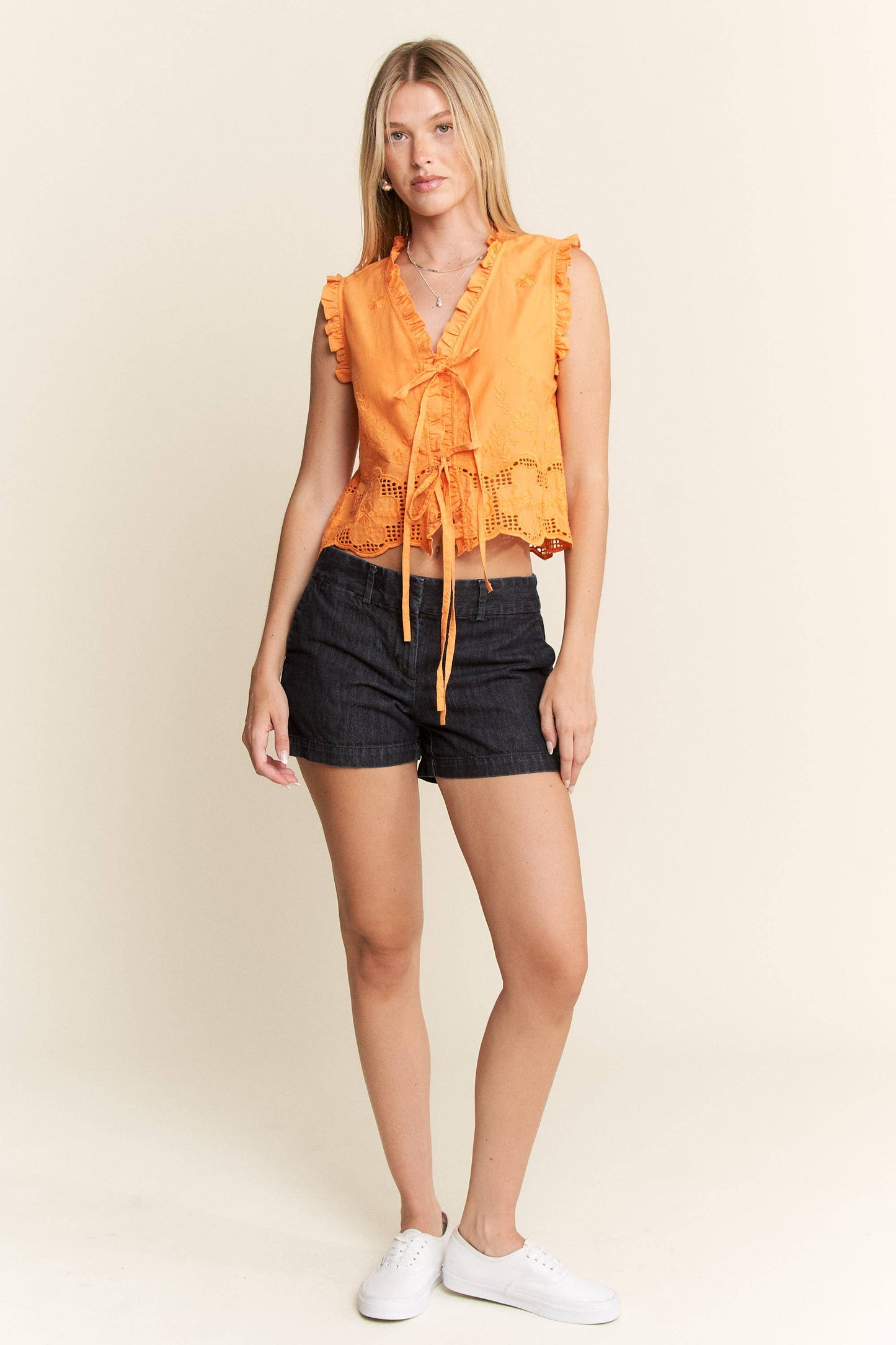 SLEEVELESS RUFFLE FRONT TIE TOP