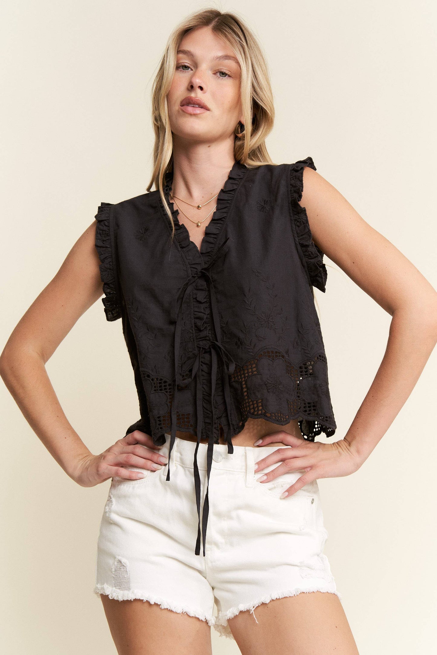SLEEVELESS RUFFLE FRONT TIE TOP