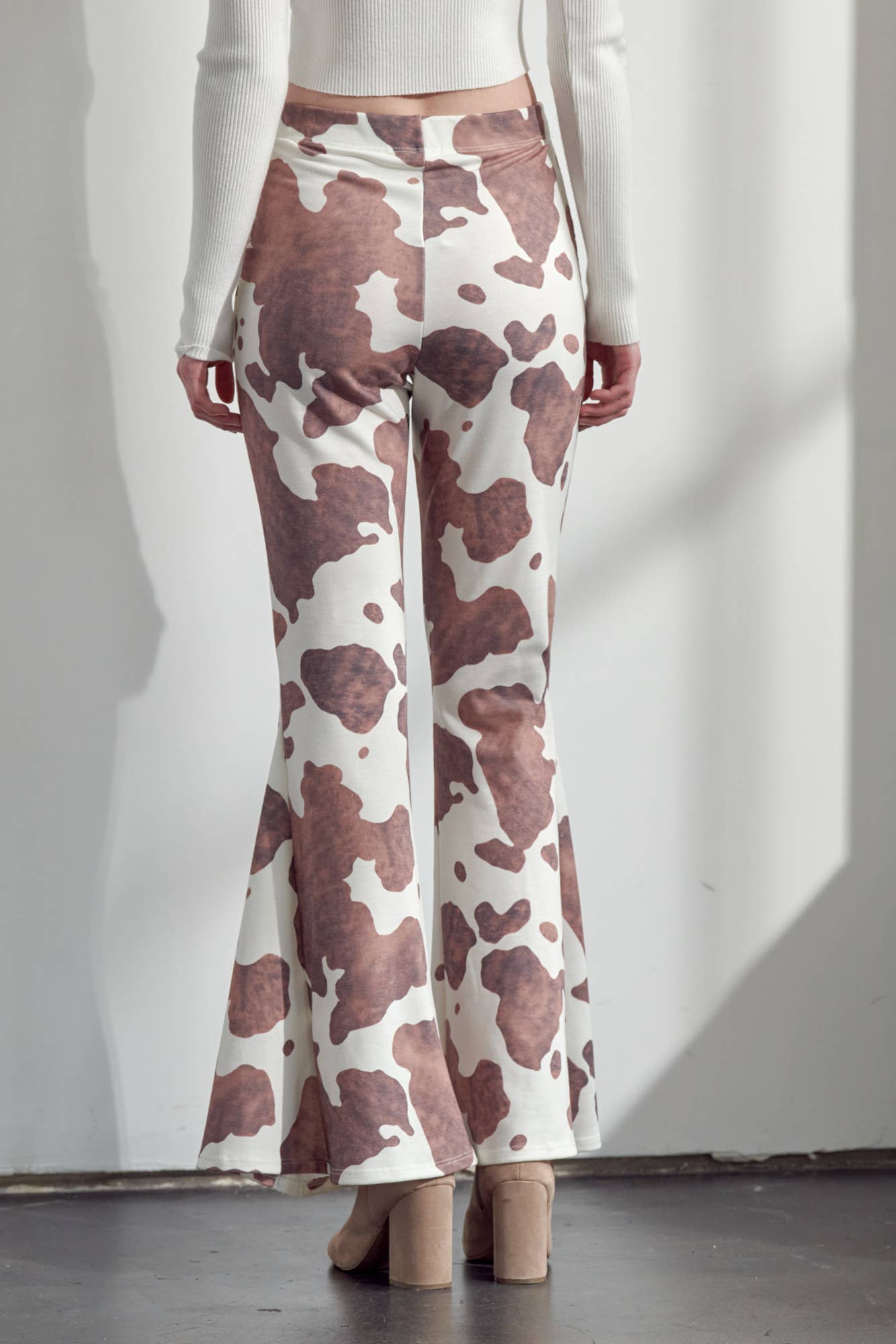 COW PRINT FLARED PANTS