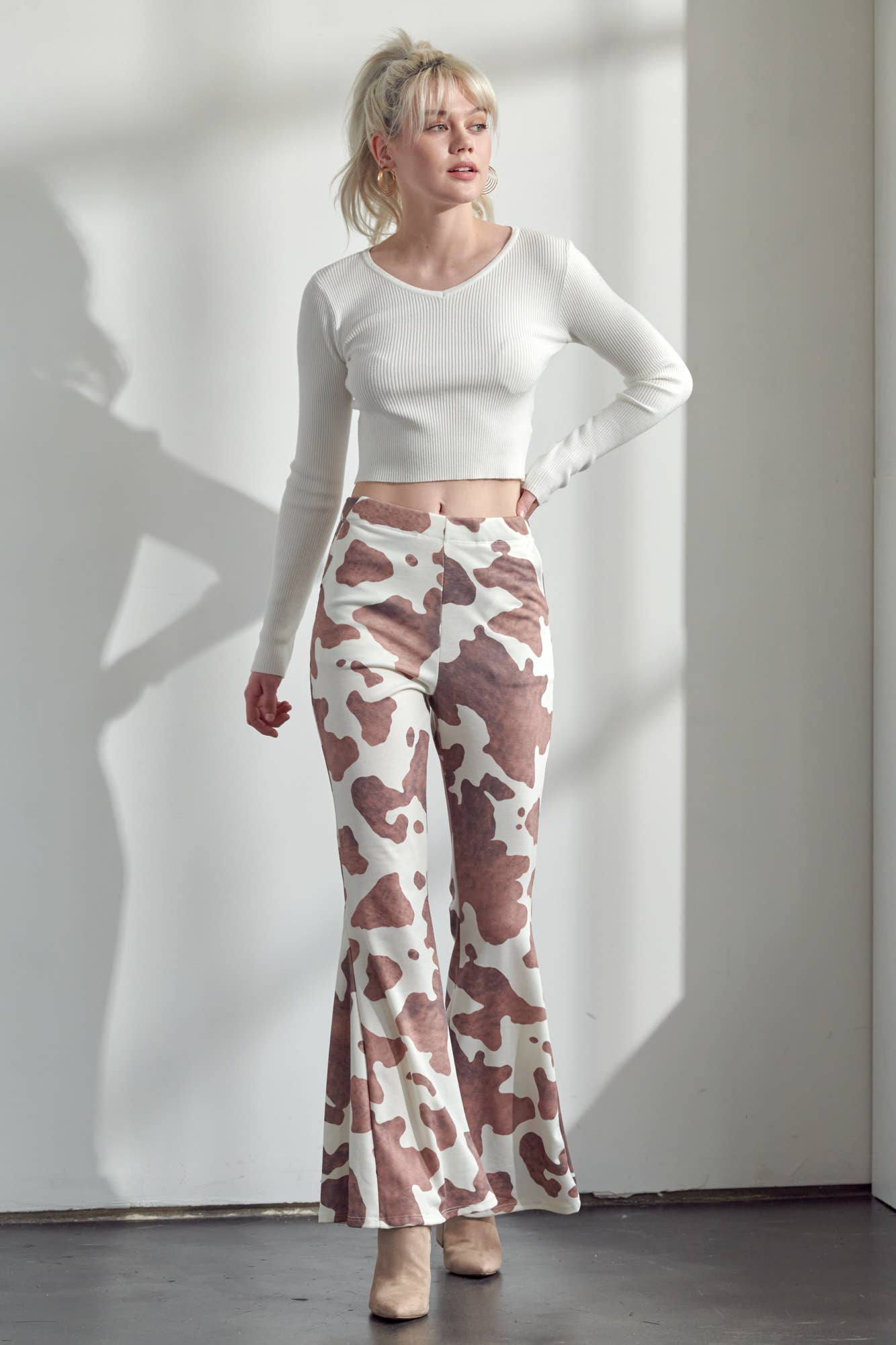 COW PRINT FLARED PANTS