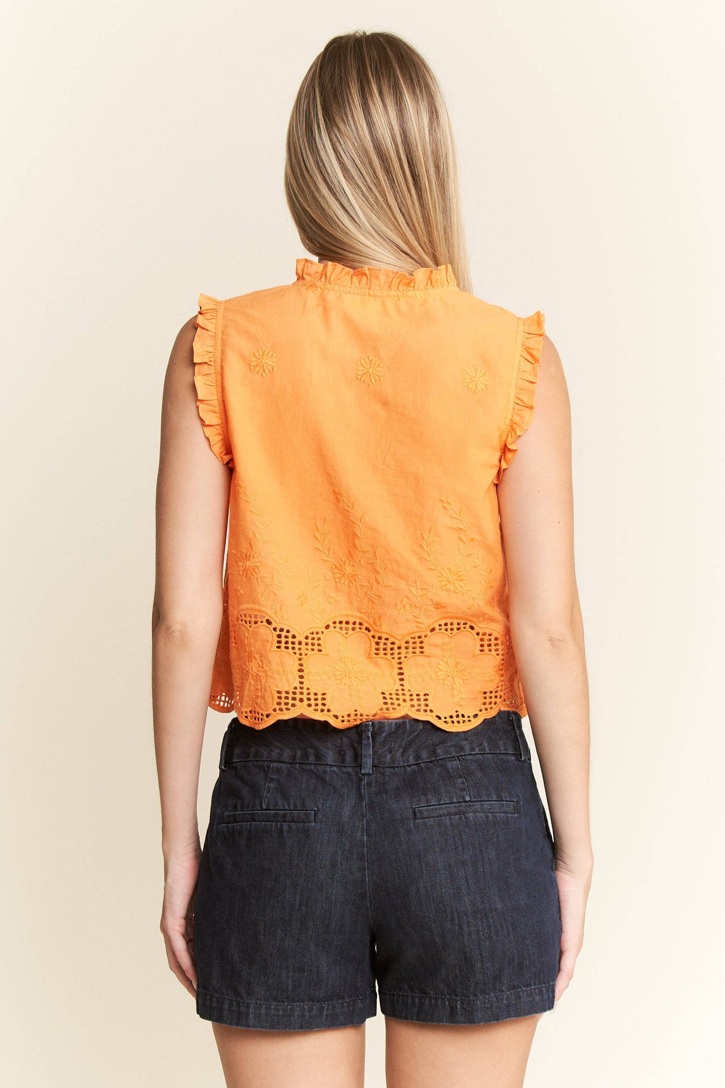 SLEEVELESS RUFFLE FRONT TIE TOP