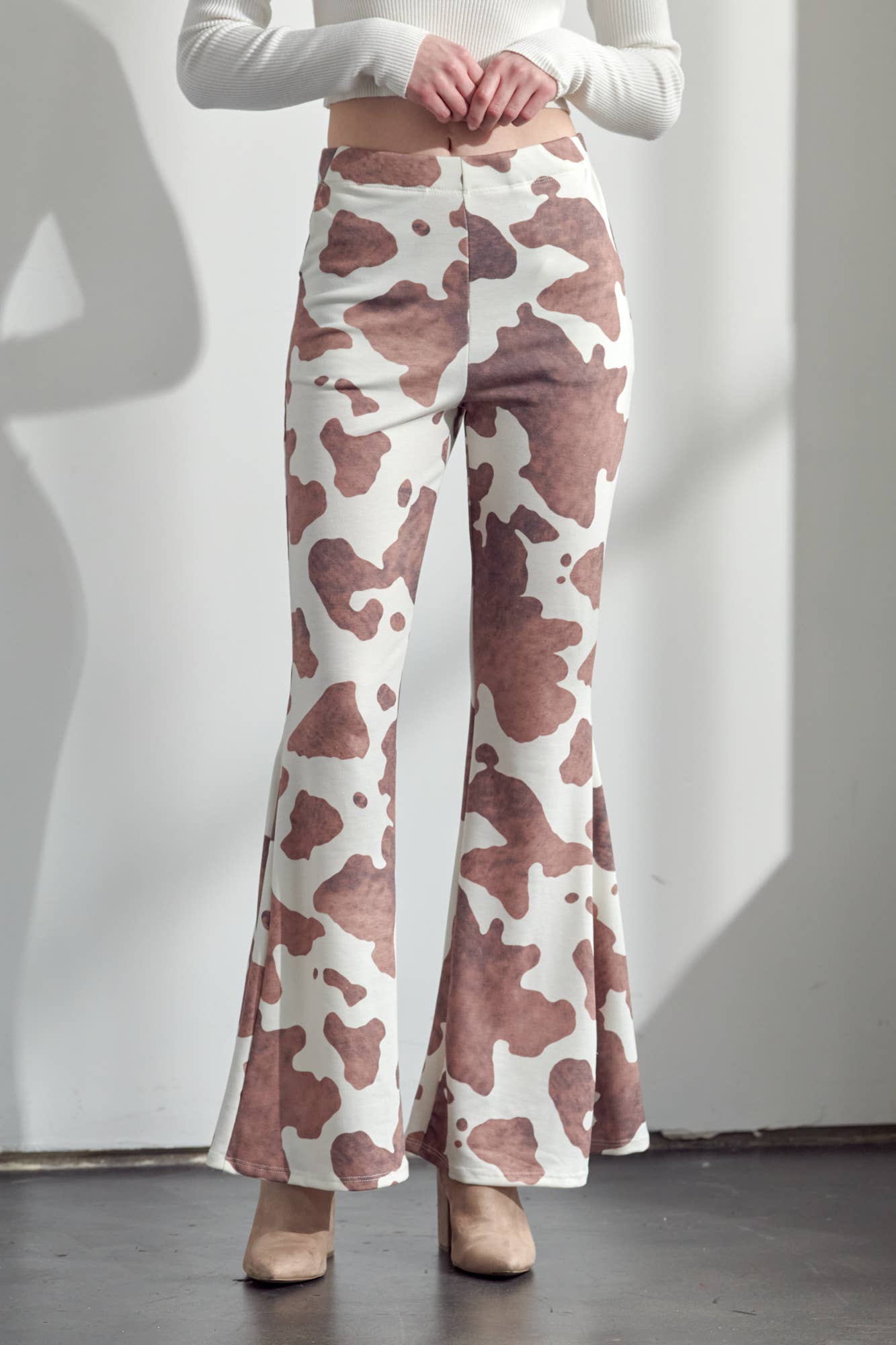 COW PRINT FLARED PANTS