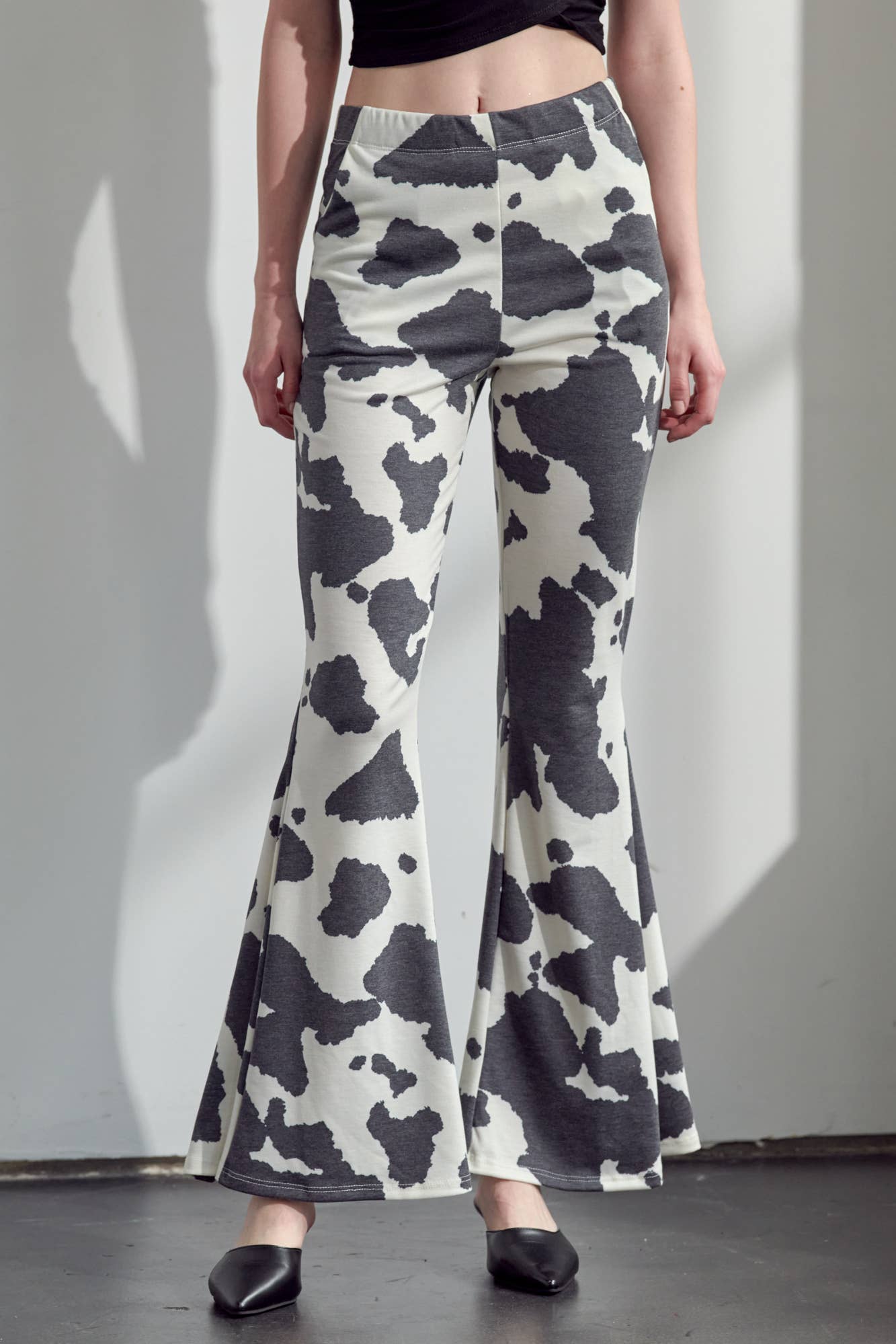 COW PRINT FLARED PANTS