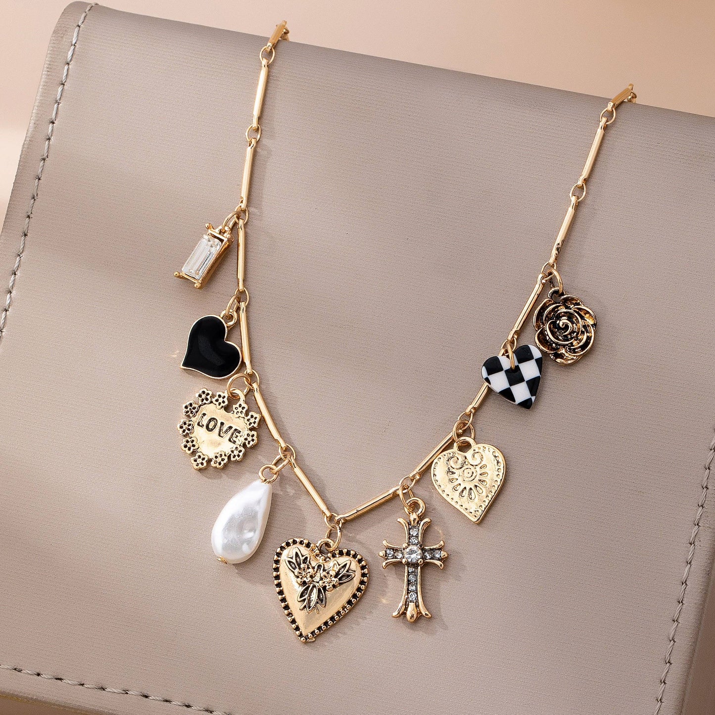 CHARM NECKLACE-HEART CHECKER CROSS CHARM | 80N92681